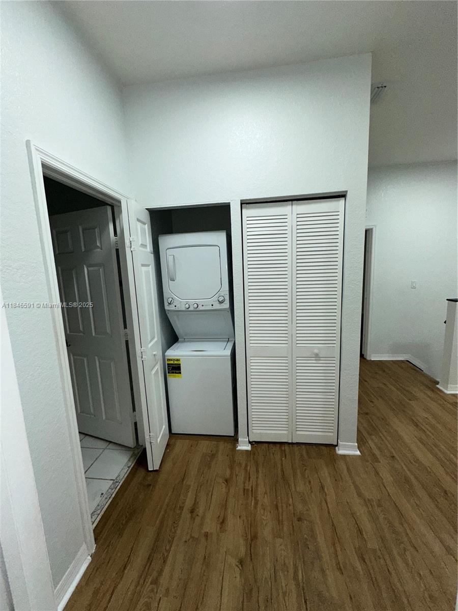 4908 Southwest 141st Avenue, Unit 3 Miramar, FL 33027 - Photo 20 of 29 wooden floor in an empty room
