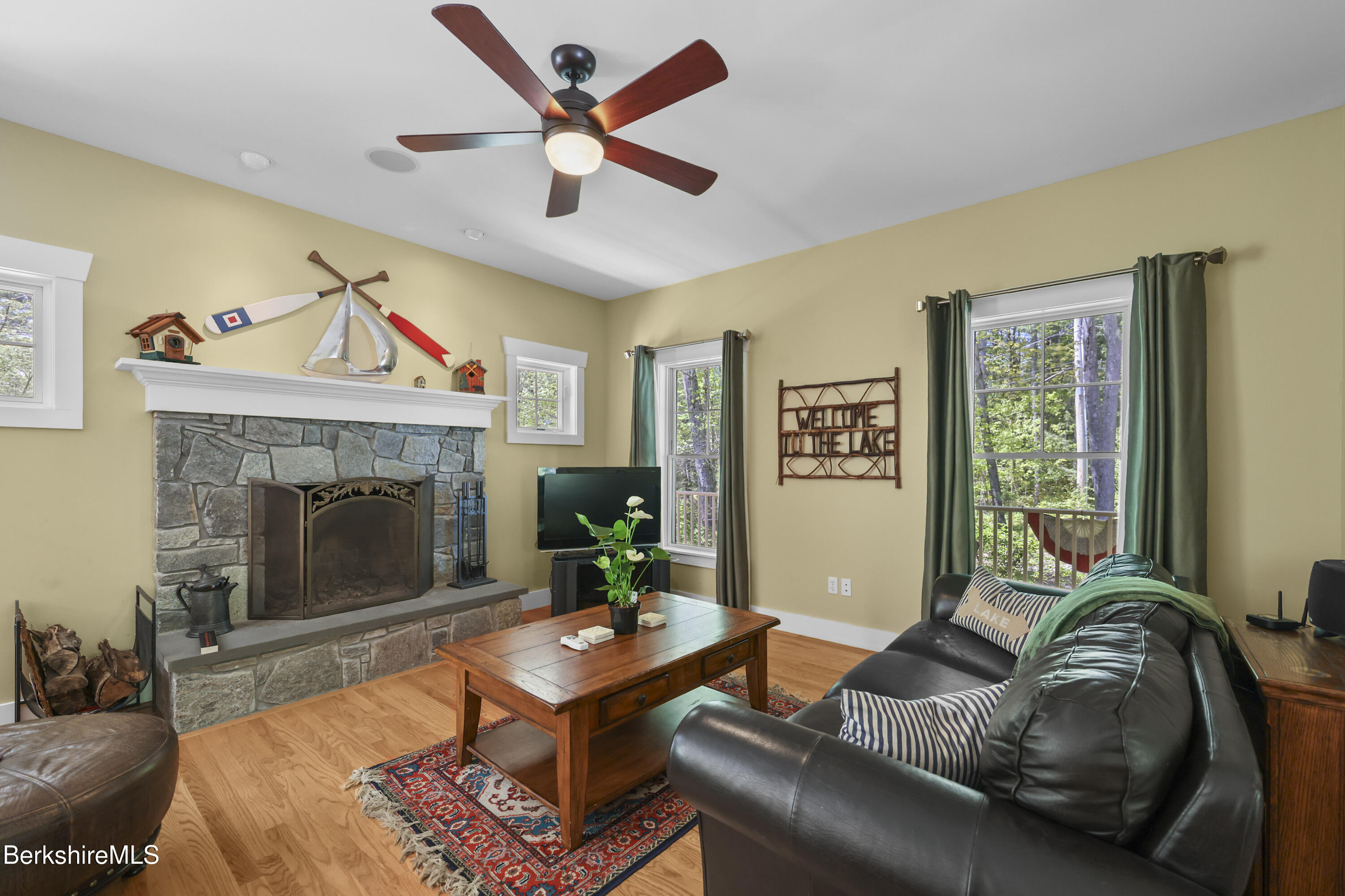 157 Pike Road Otis, MA 01029 - Photo 18 of 59 a living room with furniture and a fireplace