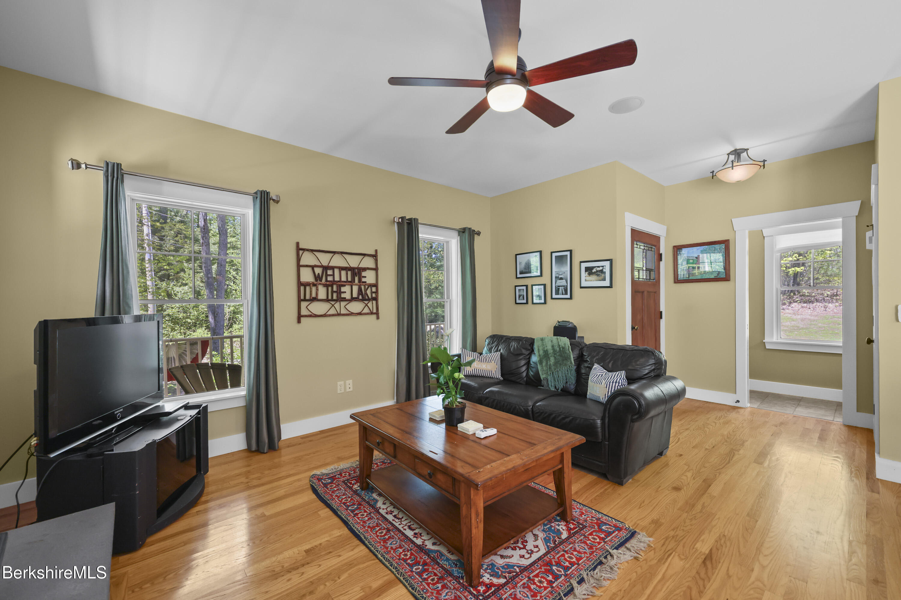 157 Pike Road Otis, MA 01029 - Photo 20 of 59 a living room with furniture and a flat screen tv