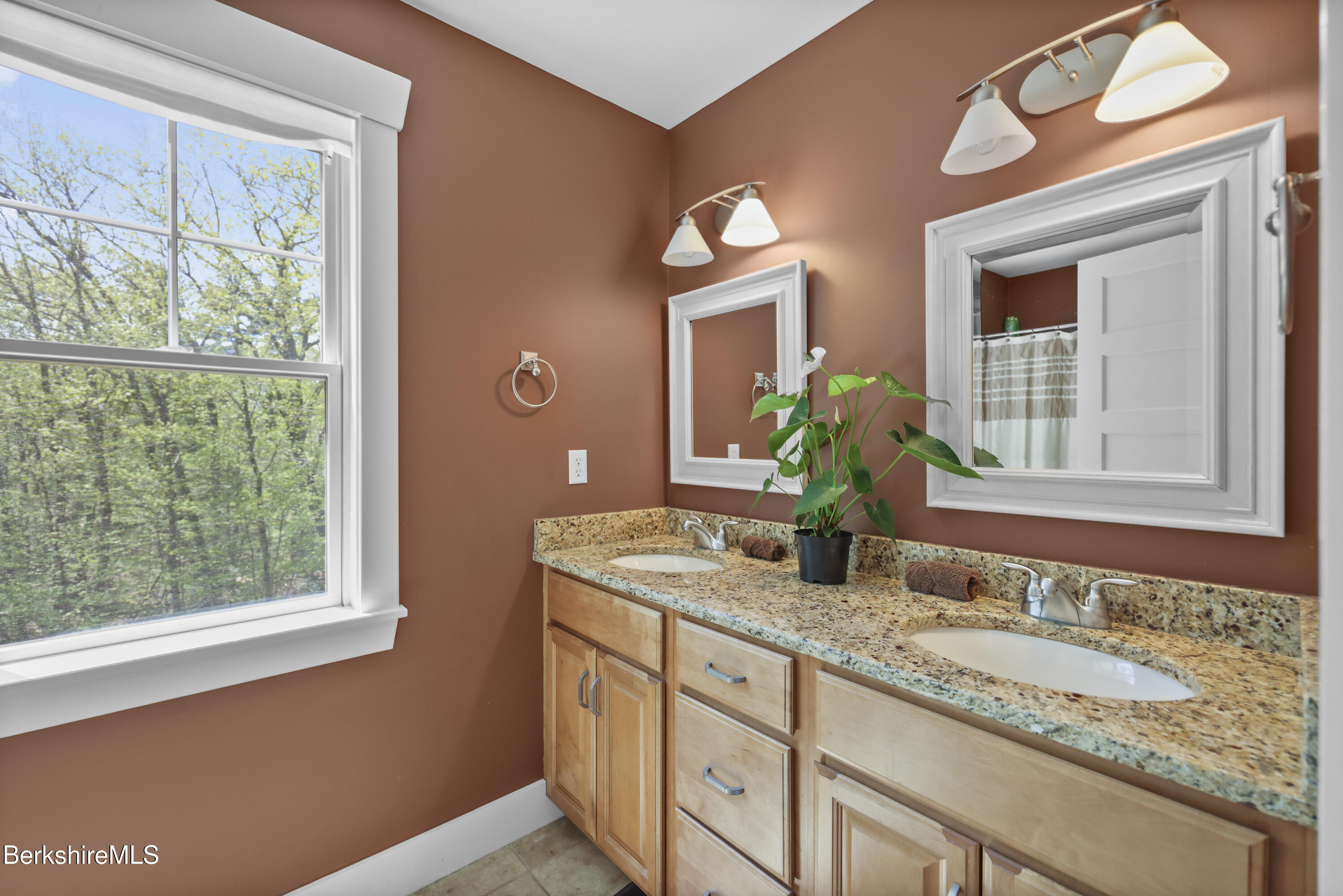 157 Pike Road Otis, MA 01029 - Photo 46 of 59 a bathroom with a granite countertop sink and a large mirror