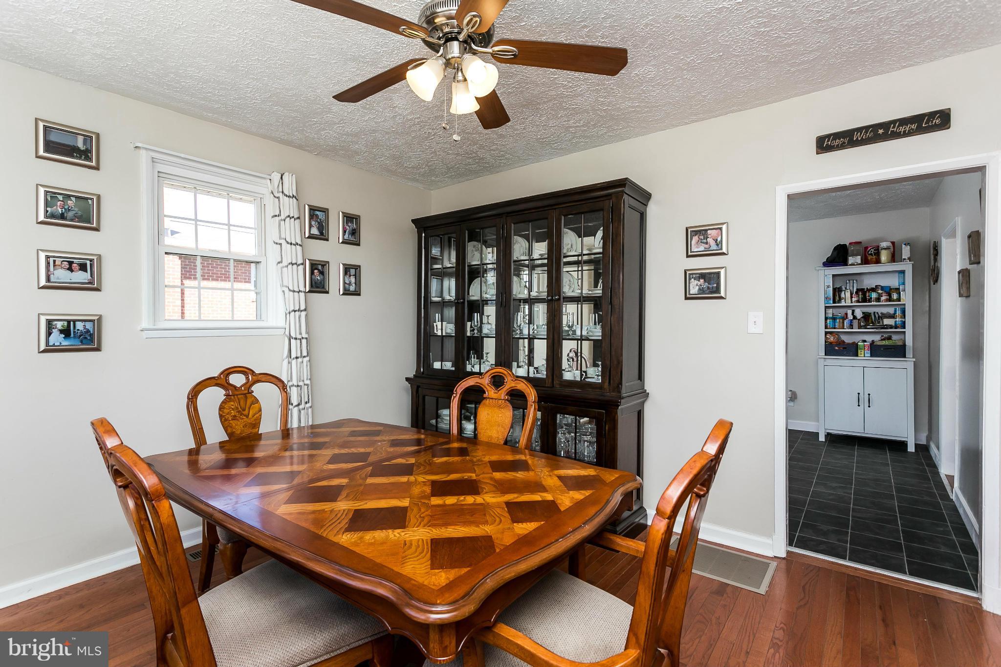 1217 Gettig Road Baltimore, MD 21237 - Photo 8 of 22 a dining room with furniture and window