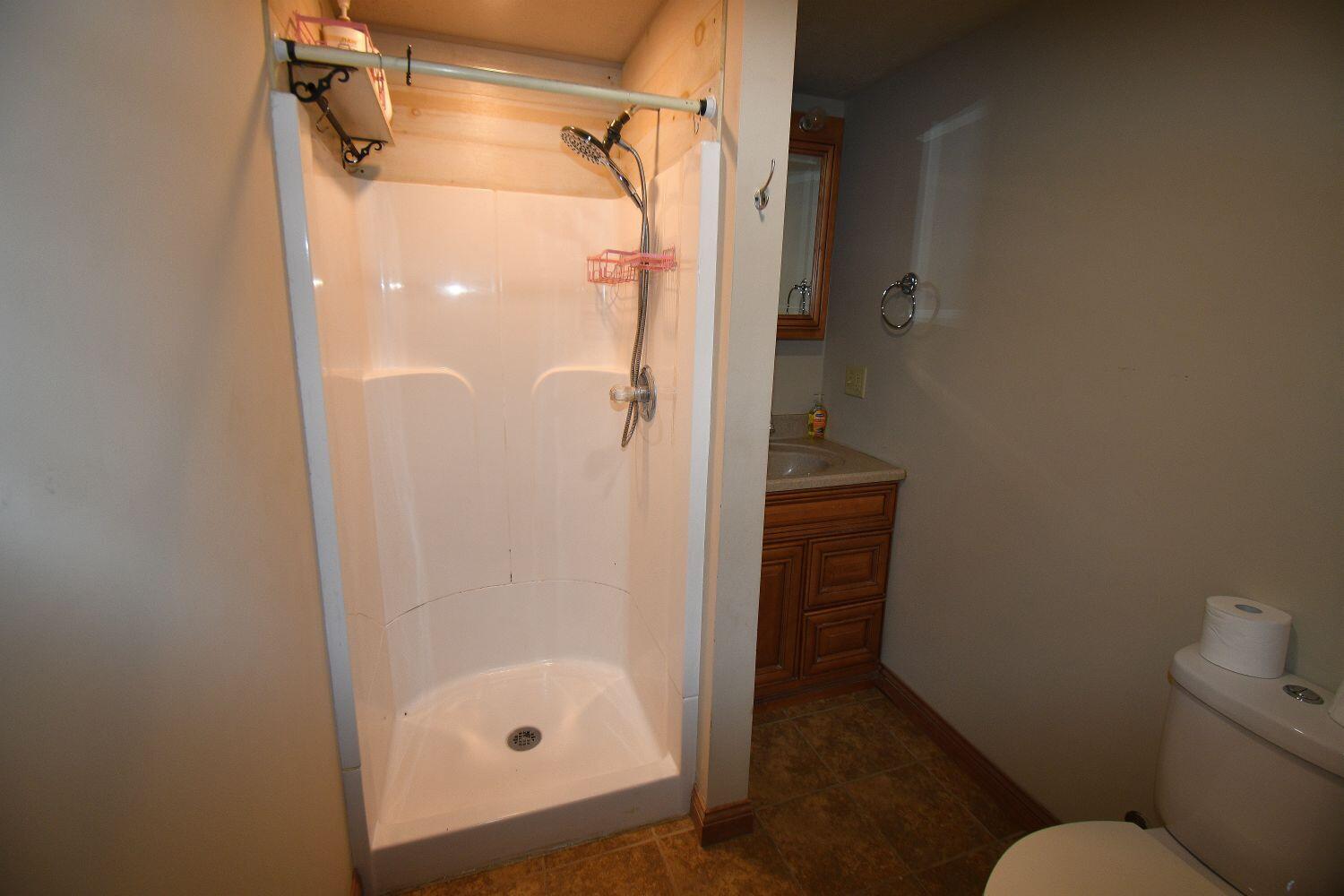 513 North College Avenue Rensselaer, IN 47978 - Photo 16 of 29 a bathroom with a shower and toilet