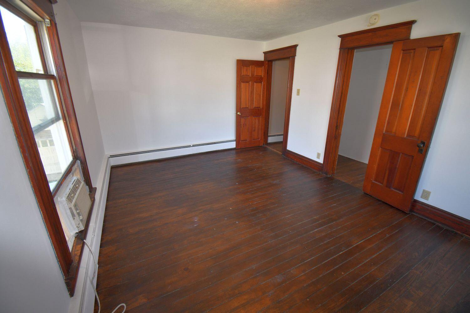 513 North College Avenue Rensselaer, IN 47978 - Photo 17 of 29 a view of an entryway with wooden floor