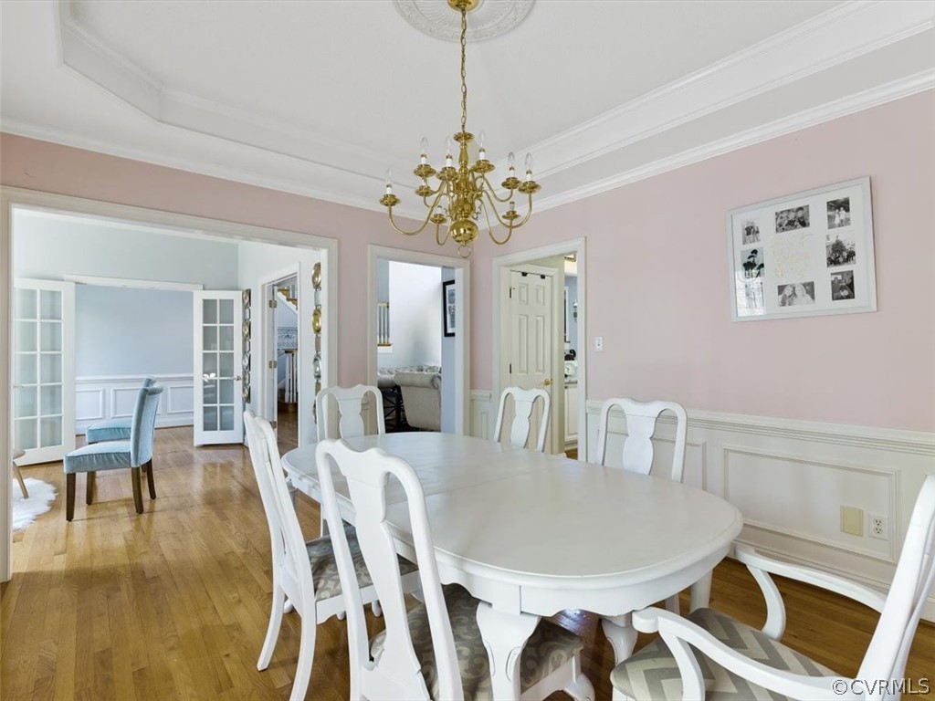 11736 Winterpock Road Chesterfield, VA 23838 - Photo 11 of 50 a view of a dining room with furniture and wooden floor