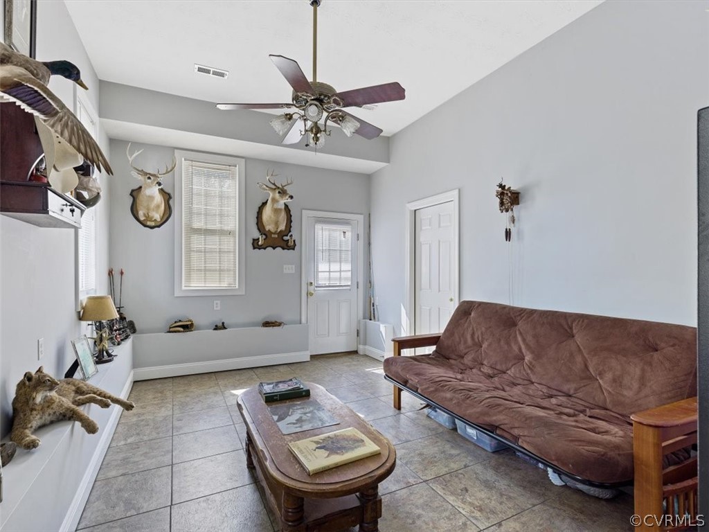 11736 Winterpock Road Chesterfield, VA 23838 - Photo 20 of 50 a living room with furniture and a chandelier