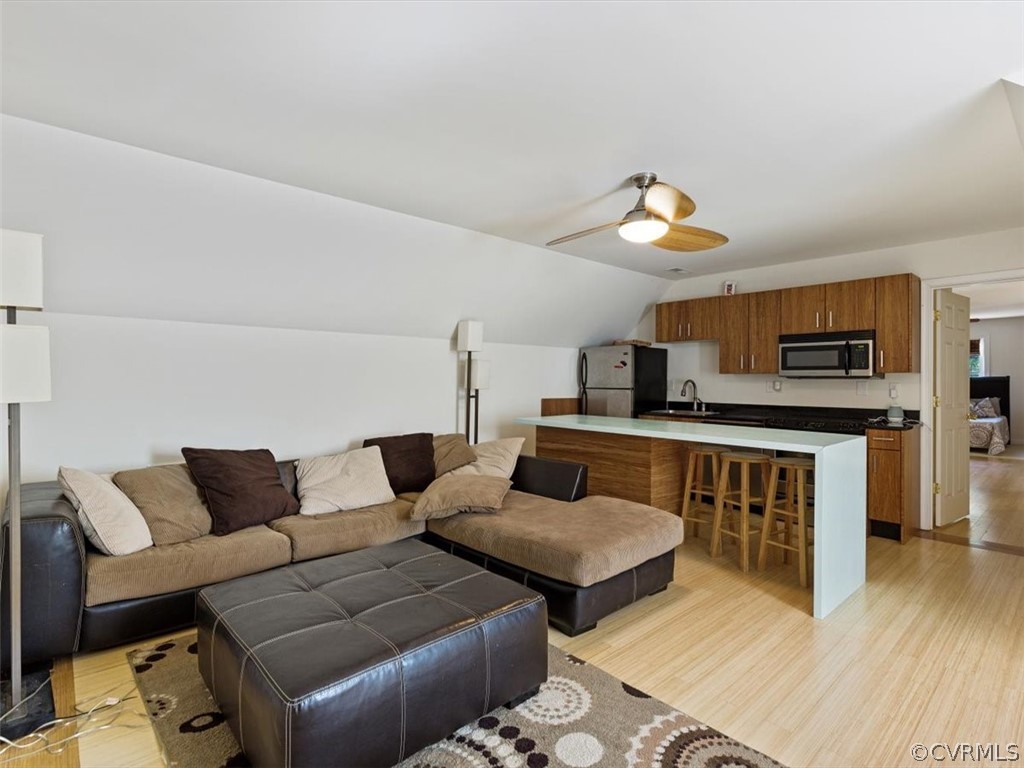 11736 Winterpock Road Chesterfield, VA 23838 - Photo 38 of 50 a living room with furniture and a wooden floor