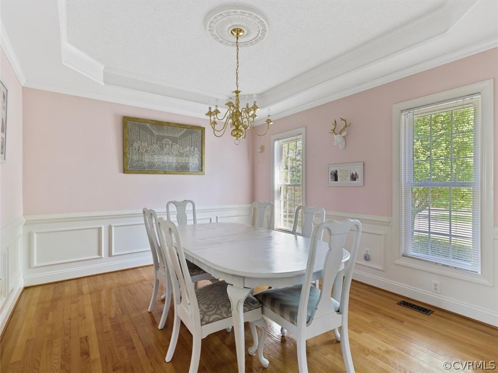 11736 Winterpock Road Chesterfield, VA 23838 - Photo 10 of 50 a view of a dining room with furniture window and wooden floor