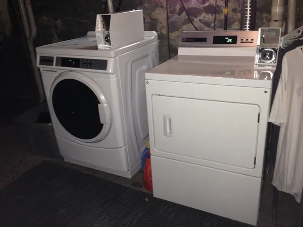 a utility room with dryer and washer
