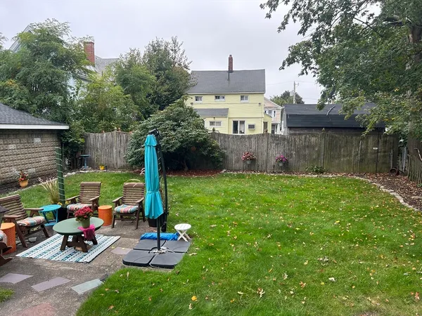a view of a chairs in front of house