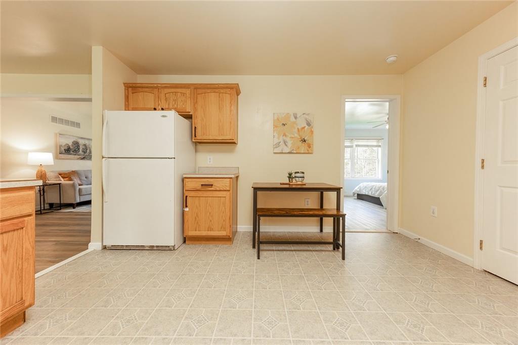 222 Hines Road Slippery Rock, PA 16057 - Photo 15 of 42 a view of kitchen with furniture and refrigerator