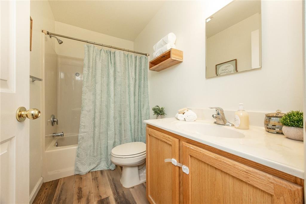 222 Hines Road Slippery Rock, PA 16057 - Photo 24 of 42 a bathroom with a sink a toilet and shower