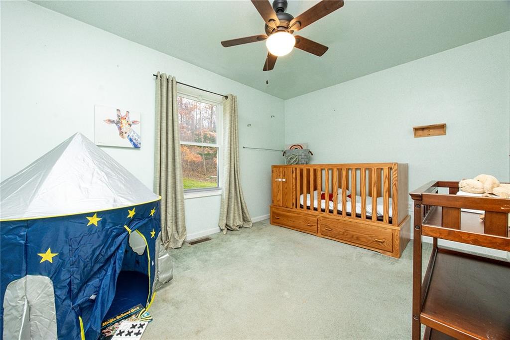 222 Hines Road Slippery Rock, PA 16057 - Photo 26 of 42 a bedroom with furniture and a window