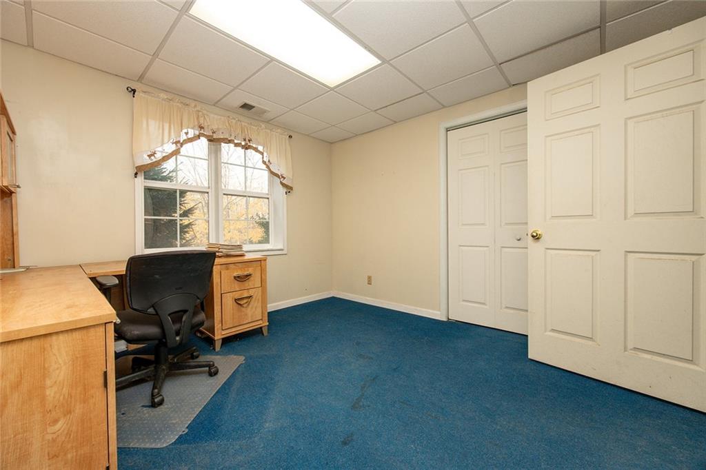 222 Hines Road Slippery Rock, PA 16057 - Photo 33 of 42 a view of a workspace with furniture and a window