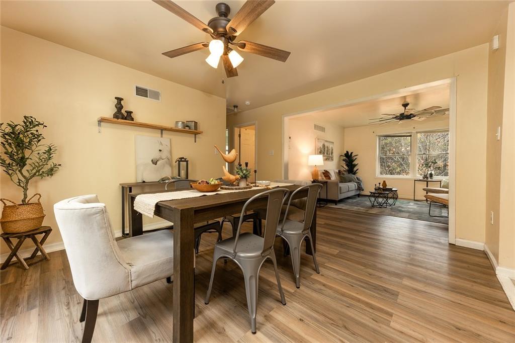 222 Hines Road Slippery Rock, PA 16057 - Photo 9 of 42 a view of a dining room with furniture and wooden floor