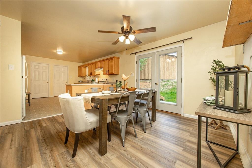 222 Hines Road Slippery Rock, PA 16057 - Photo 10 of 42 a view of a dining room with furniture window and wooden floor