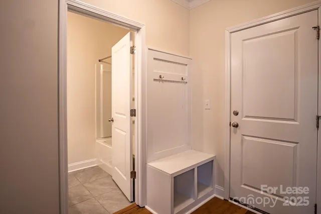 a bathroom with a shower and a sink