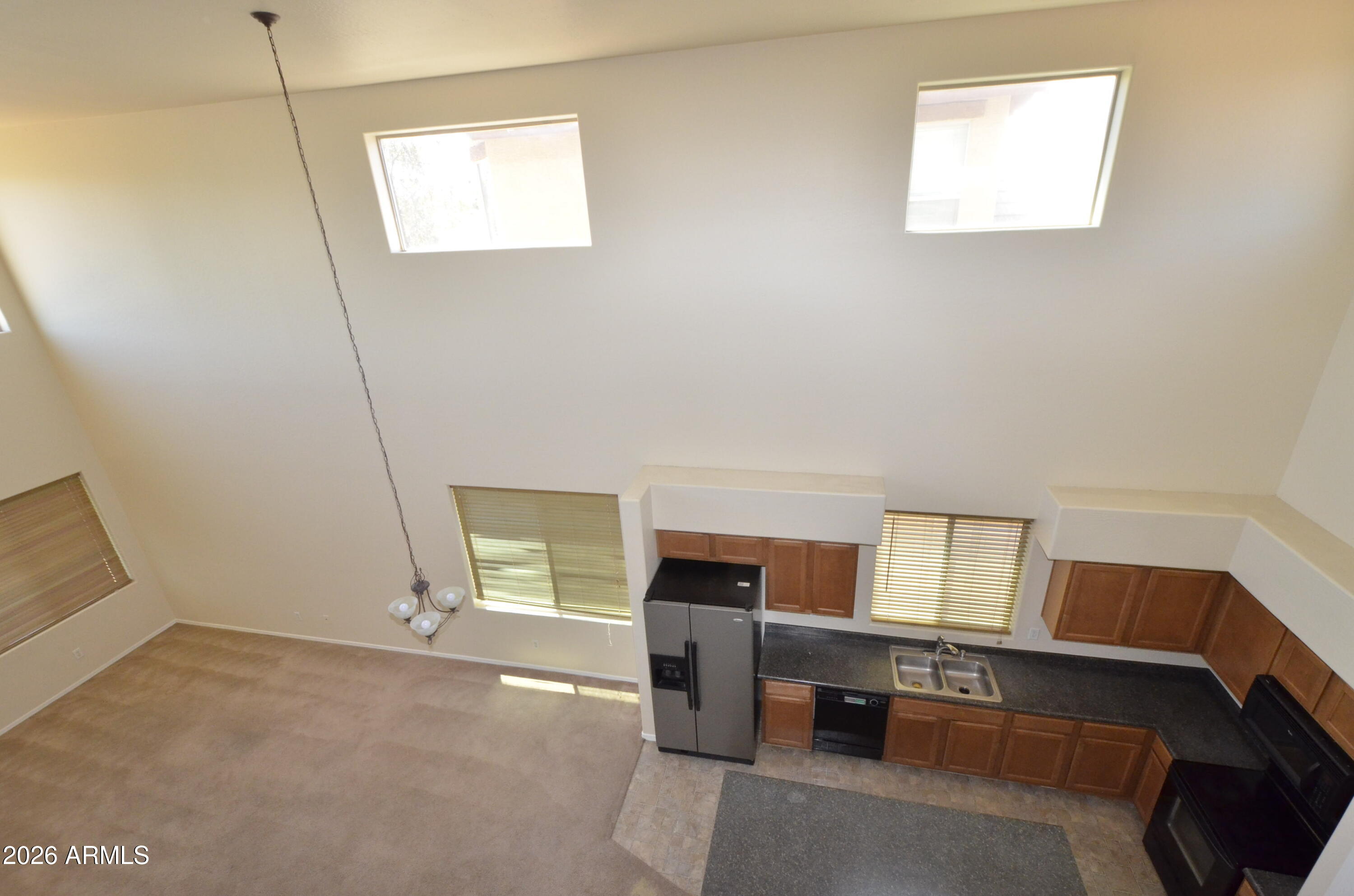 3995 East Trigger Way Gilbert, AZ 85297 - Photo 13 of 23 a room with furniture and window