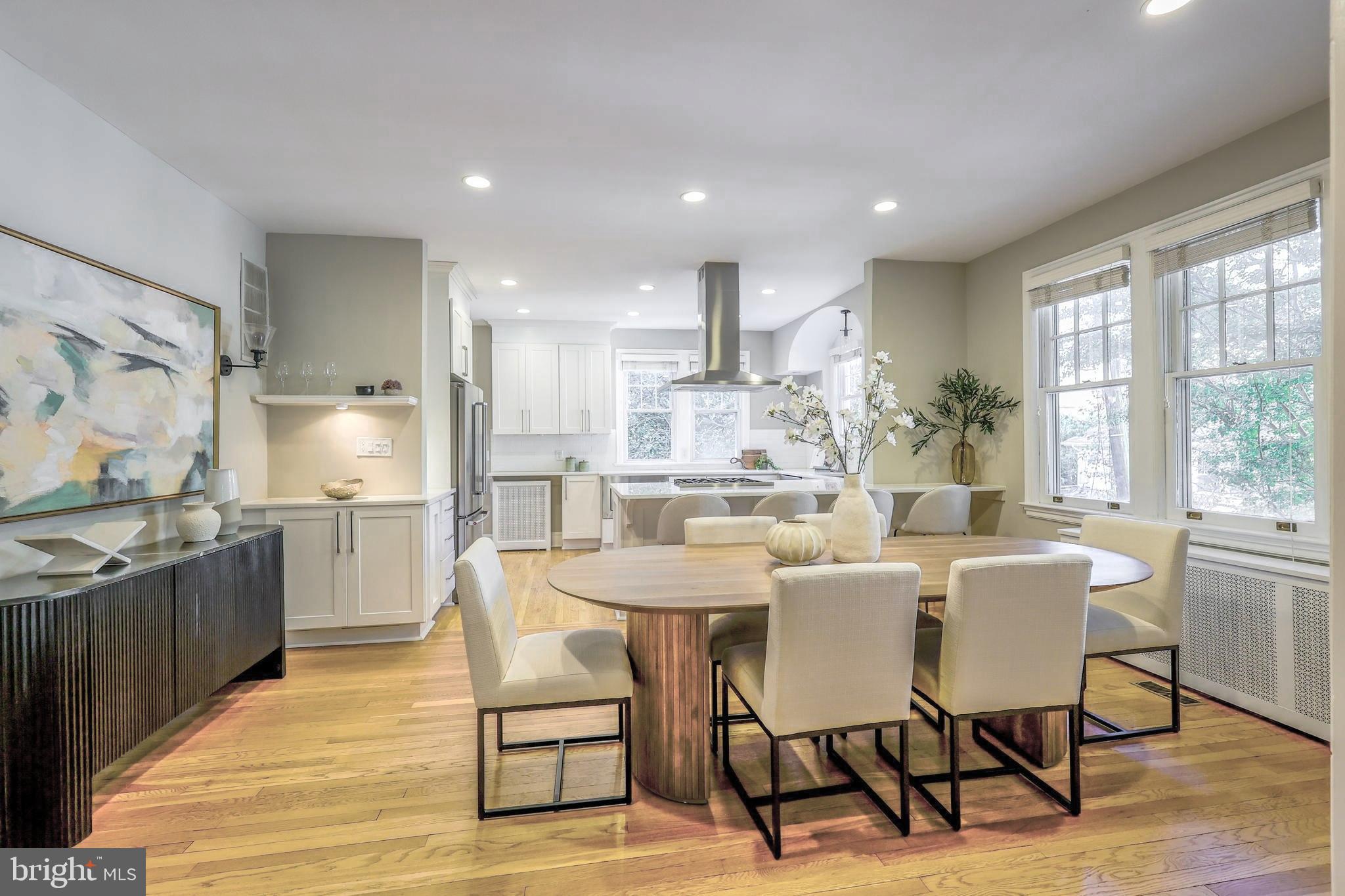 3230 Military Road Northwest Washington, DC 20015 - Photo 11 of 61 a large kitchen with a table and chairs