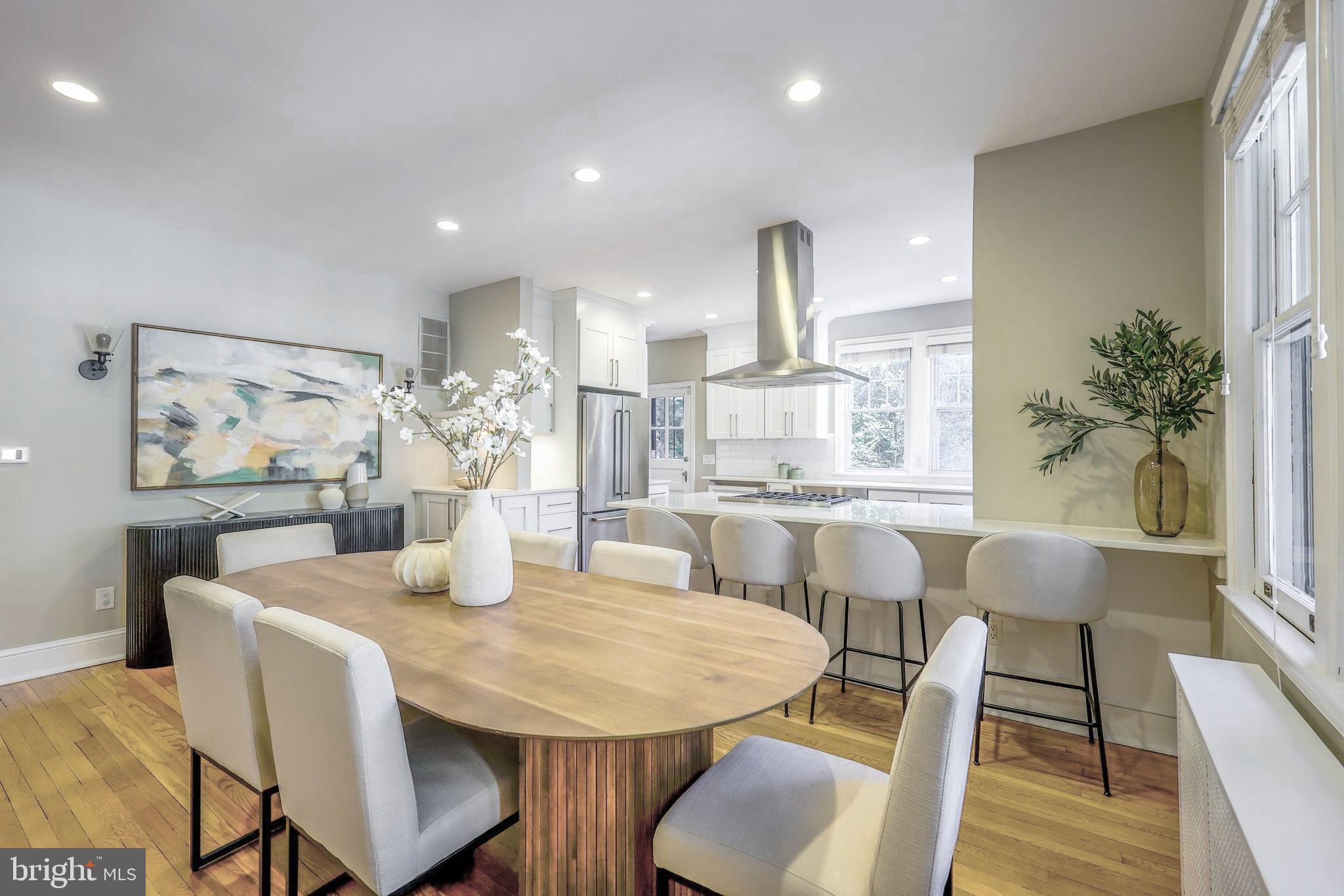 3230 Military Road Northwest Washington, DC 20015 - Photo 12 of 61 a view of a dining room with furniture and wooden floor