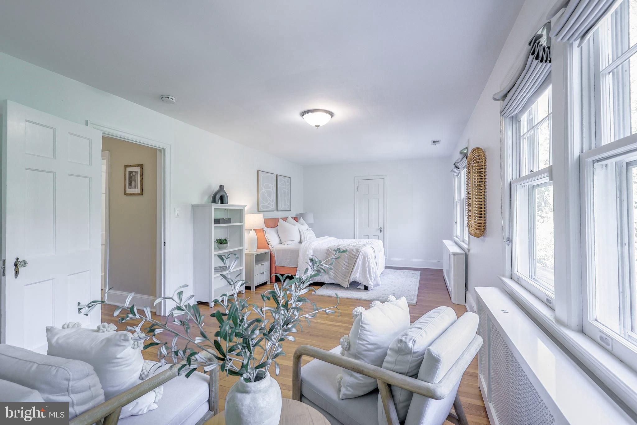 3230 Military Road Northwest Washington, DC 20015 - Photo 32 of 61 a living room with furniture fireplace and a large window