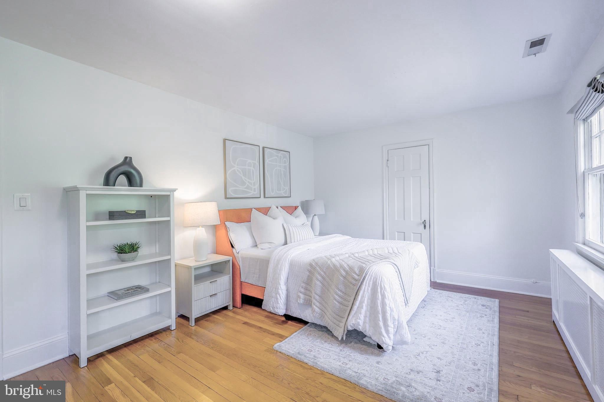 3230 Military Road Northwest Washington, DC 20015 - Photo 33 of 61 a bedroom with a bed and a window
