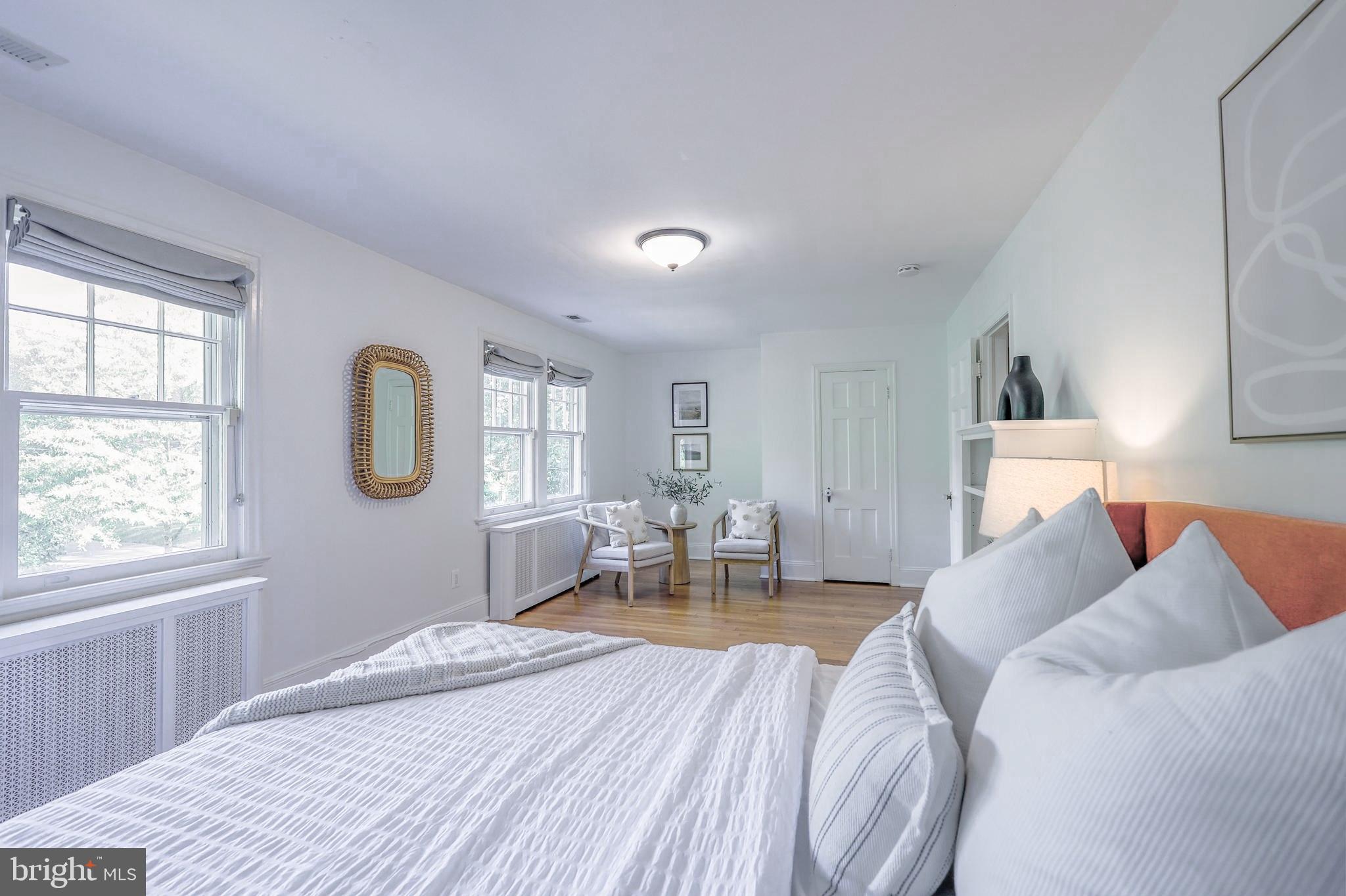 3230 Military Road Northwest Washington, DC 20015 - Photo 38 of 61 a bed room with a bed and a chair