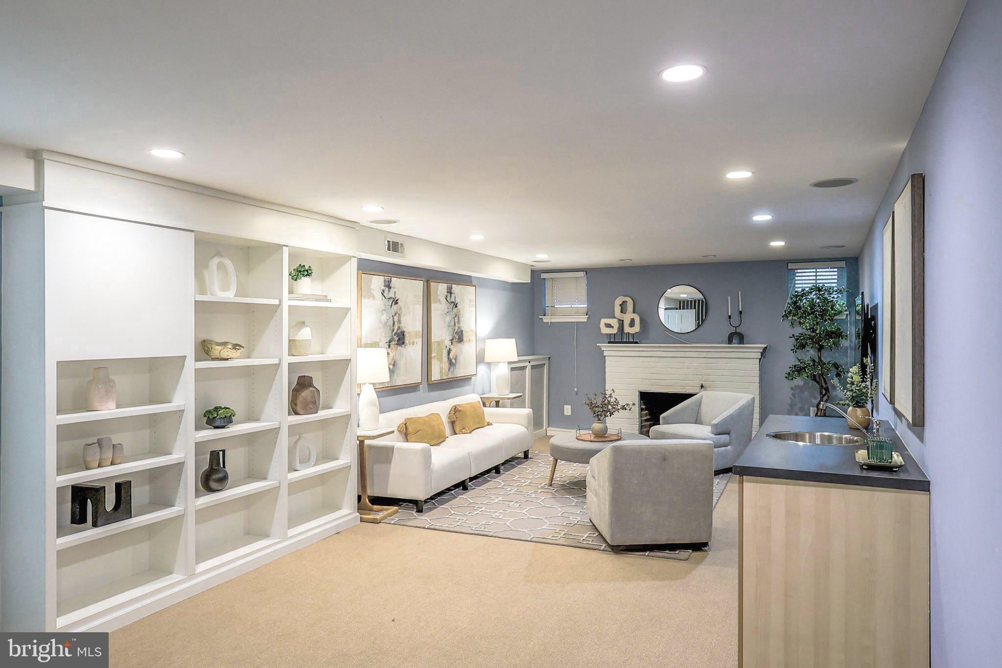 3230 Military Road Northwest Washington, DC 20015 - Photo 43 of 61 a living room with furniture and a potted plant
