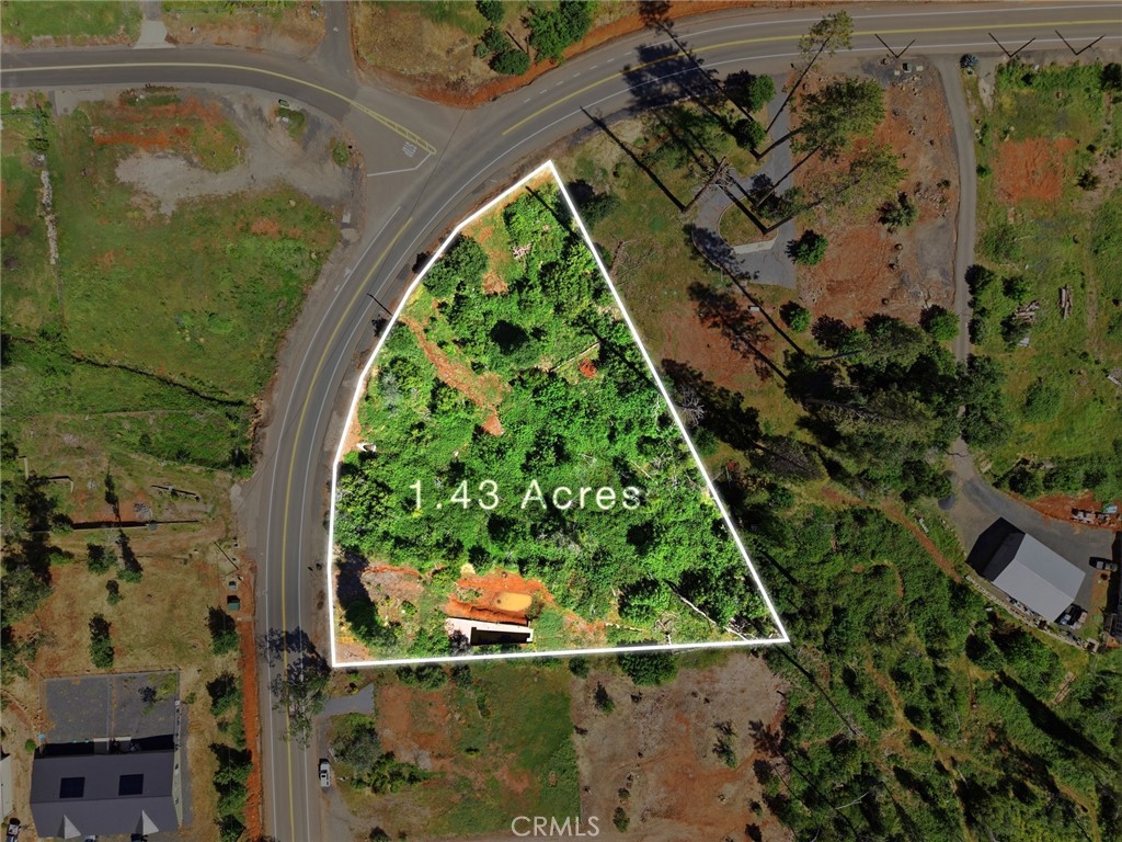 988 Pearson Road Paradise, CA 95969 - Photo 2 of 13 an aerial view of a house with a yard