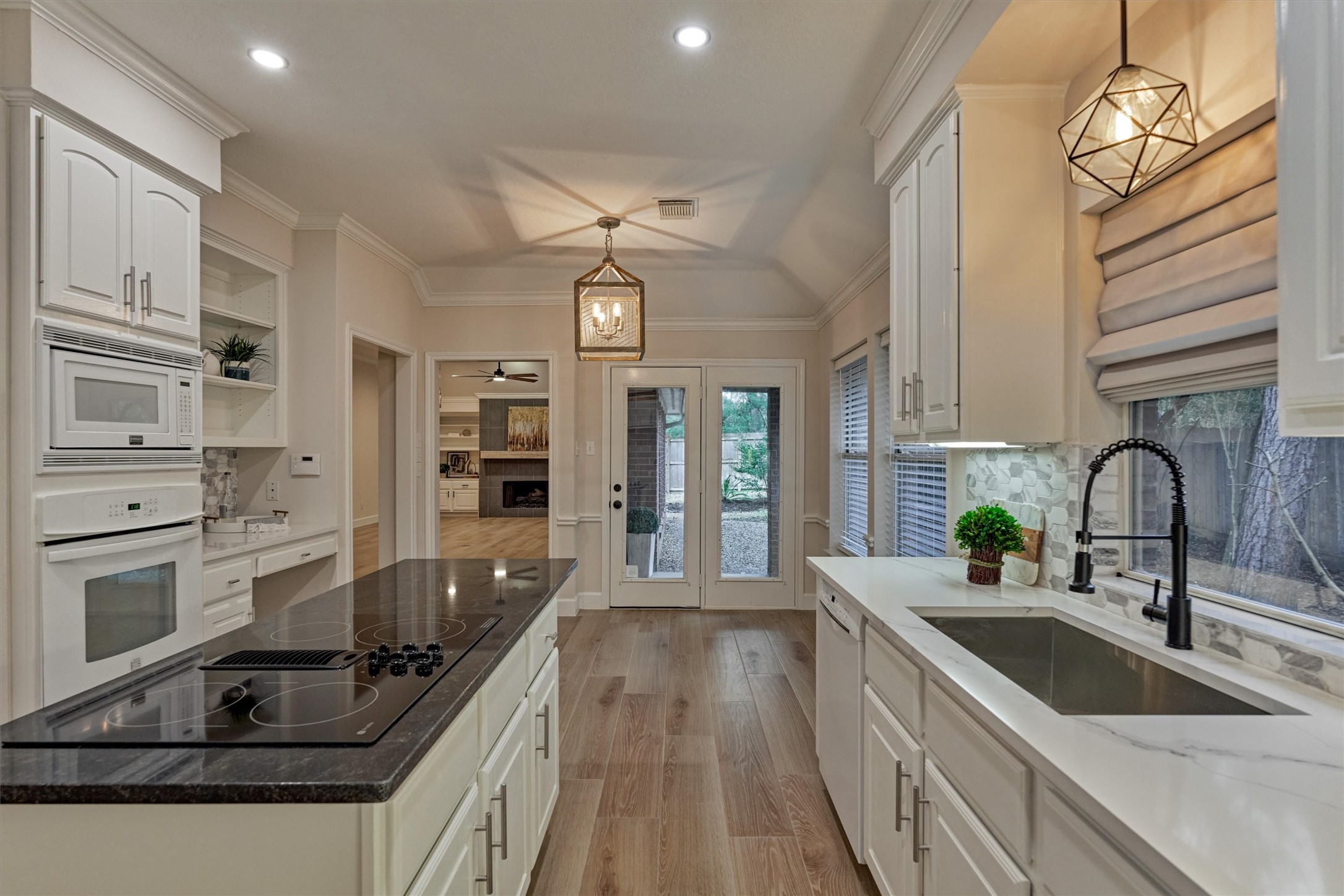 3 Heartleaf Court Spring, TX 77381 - Photo 14 of 46 All living areas blend seamlessly throughout. Note: there's a chef's planning area to the left with room for a chair and built-ins!