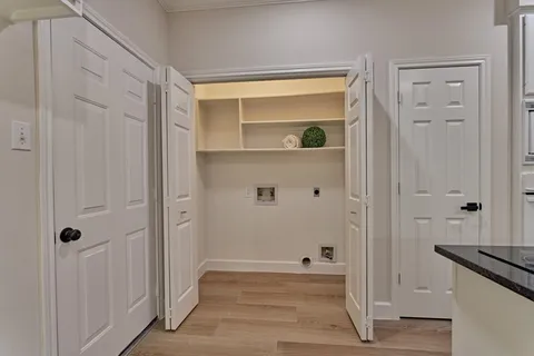 a view of a house with a yard and tree s