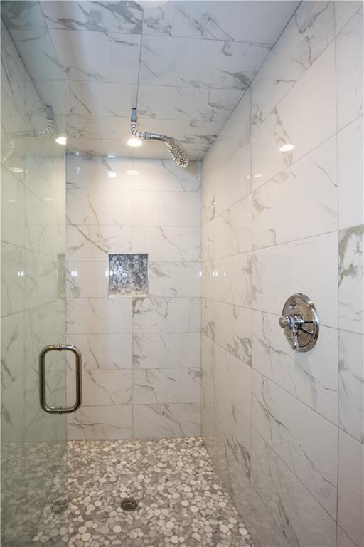 1907 Cambridge Avenue Atlanta, GA 30337 - Photo 12 of 24 a bathroom with a shower