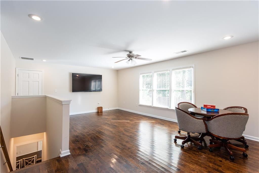 1907 Cambridge Avenue Atlanta, GA 30337 - Photo 17 of 24 a living room with furniture and a flat screen tv