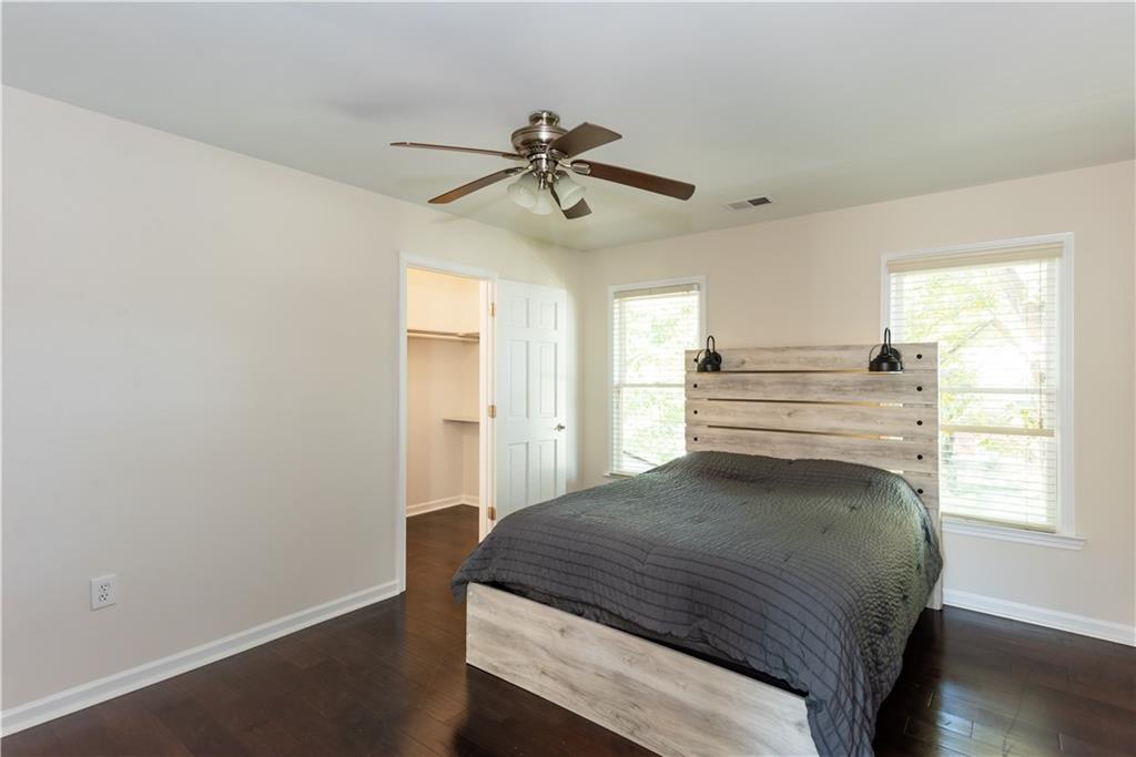 1907 Cambridge Avenue Atlanta, GA 30337 - Photo 18 of 24 a bedroom with a bed and window