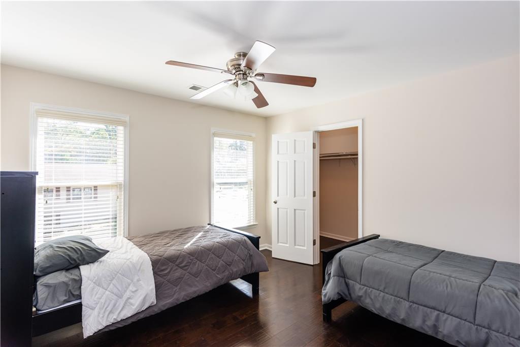 1907 Cambridge Avenue Atlanta, GA 30337 - Photo 21 of 24 a bedroom with bed and a window