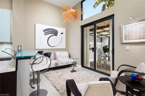 a living room with furniture and window