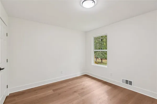 a bath room with a sink and a bath tub
