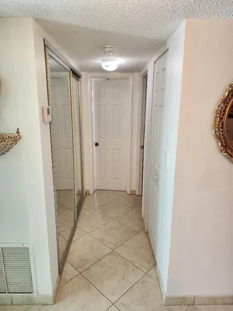 a view of hallway with shower