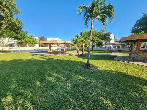 a view of a house with a big yard