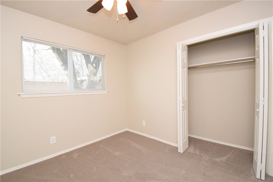 6400 Brookside Drive, Unit B Austin, TX 78723 - Photo 11 of 25 an empty room with a window
