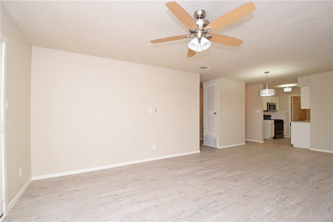 6400 Brookside Drive, Unit B Austin, TX 78723 - Photo 20 of 25 an empty room with fan and a ceiling fan