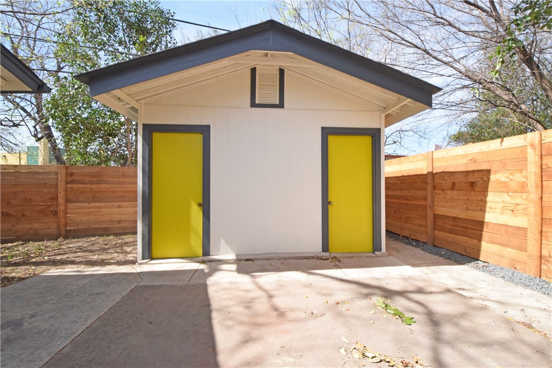 6400 Brookside Drive, Unit B Austin, TX 78723 - Photo 23 of 25 a front view of a house with a yard