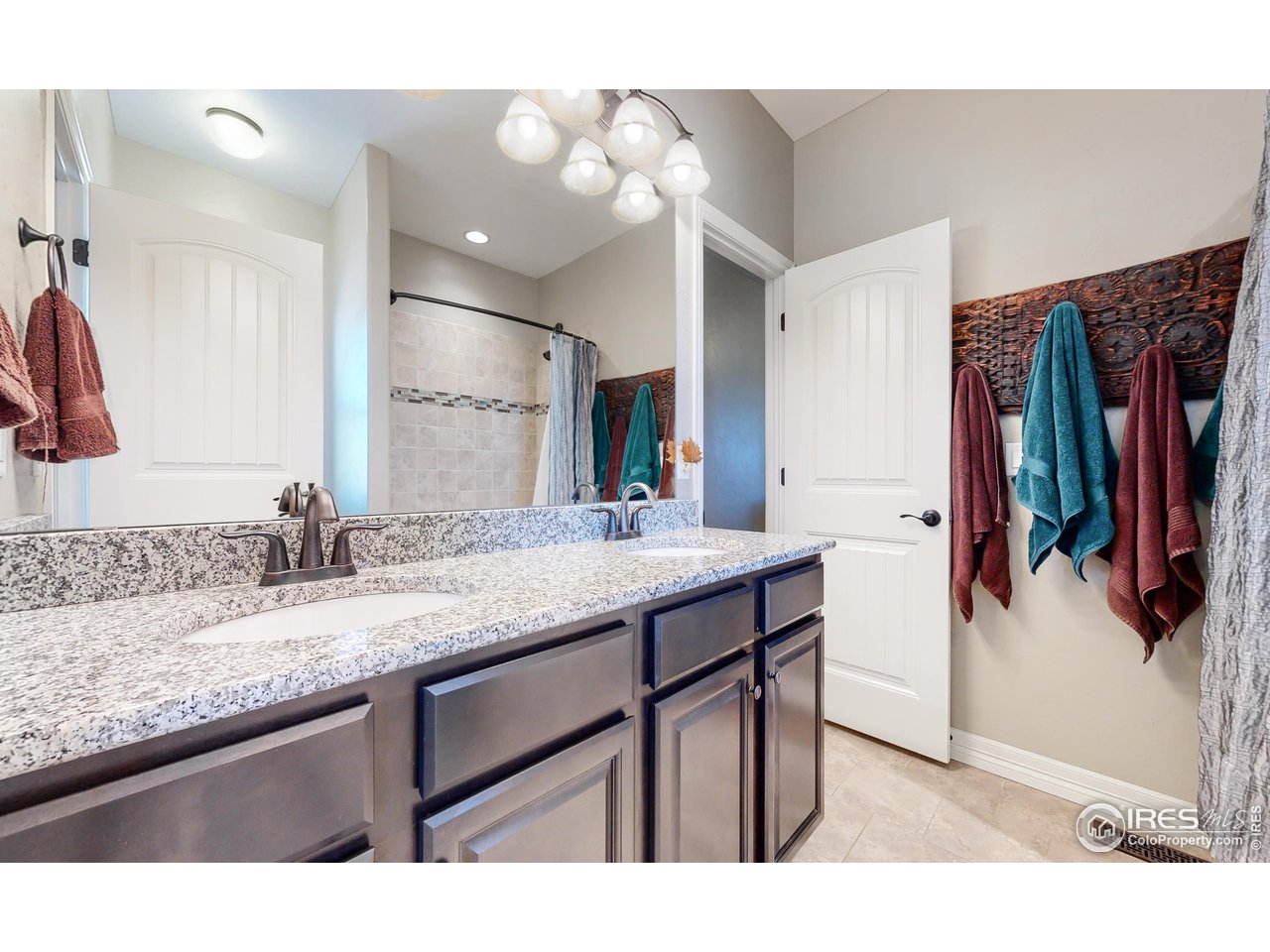 3201 Timeless Circle Berthoud, CO 80513 - Photo 15 of 39 Jack and Jill bathroom between bedrooms 2 and 3