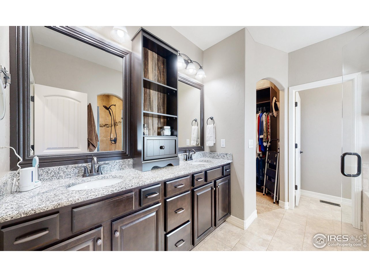 3201 Timeless Circle Berthoud, CO 80513 - Photo 18 of 39 En-suite double vanity with plenty of cabinet storage