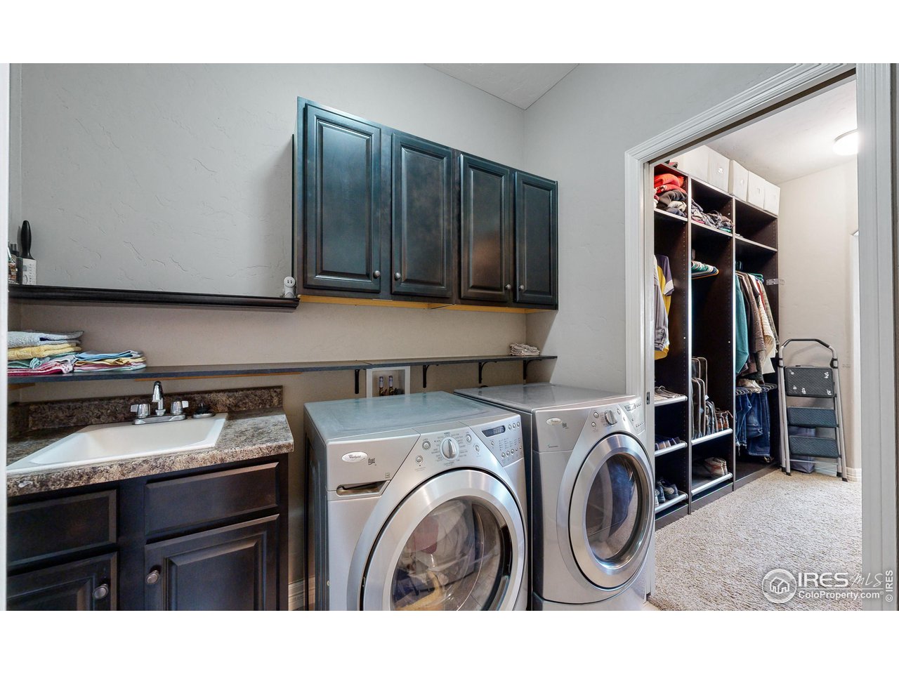 3201 Timeless Circle Berthoud, CO 80513 - Photo 20 of 39 Primary master walk in closet with access to laundry