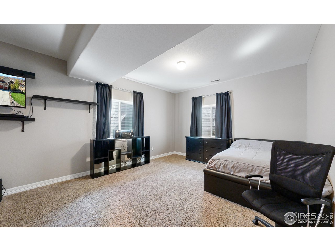 3201 Timeless Circle Berthoud, CO 80513 - Photo 27 of 39 Large 6th bedroom in basement with walk in closet