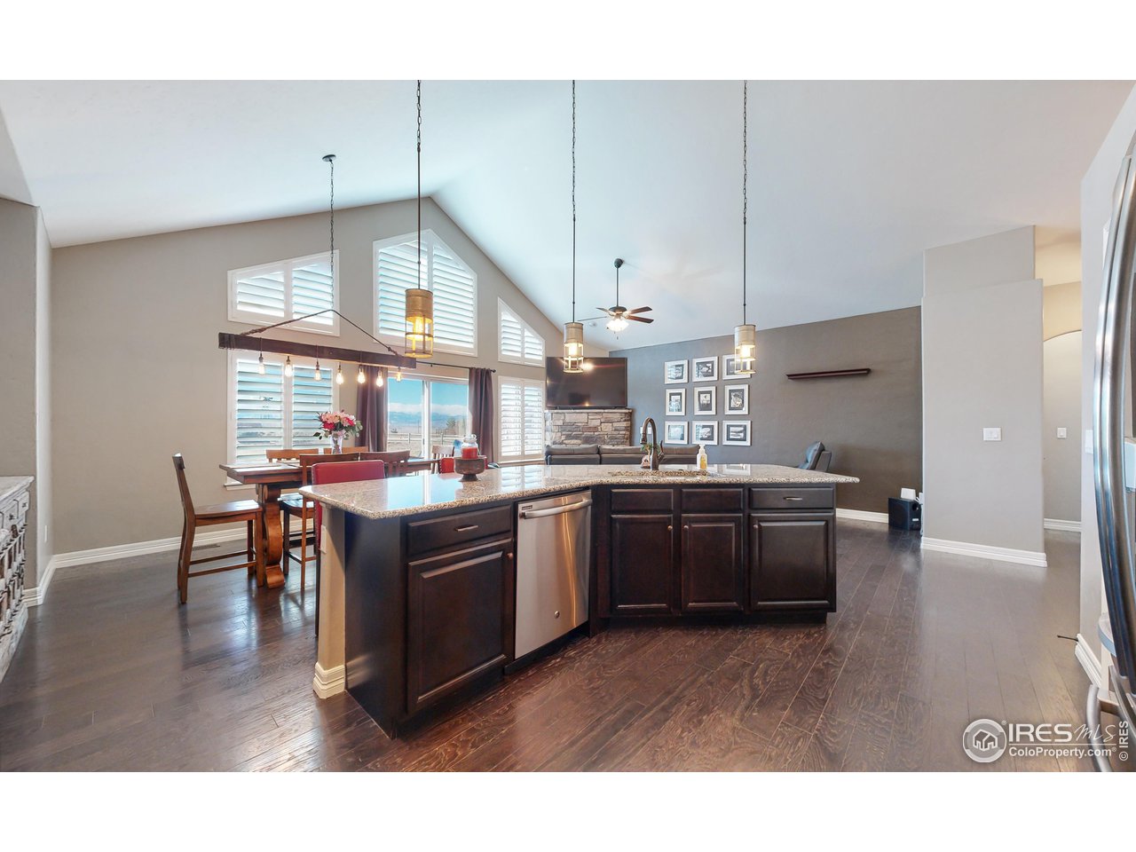 3201 Timeless Circle Berthoud, CO 80513 - Photo 7 of 39 Center island looking into living room