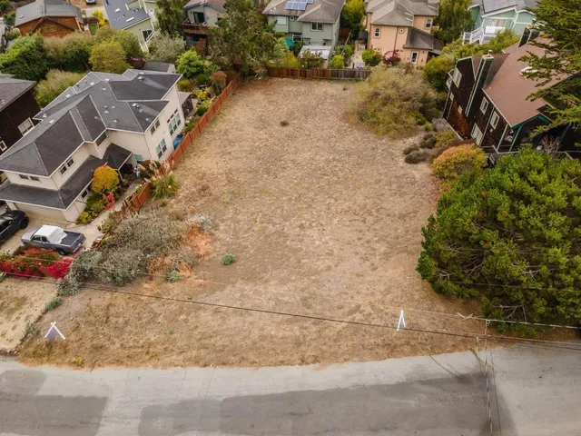 an aerial view of residential house with outdoor space