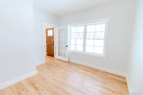 a spacious bathroom with a double vanity sink mirror and double