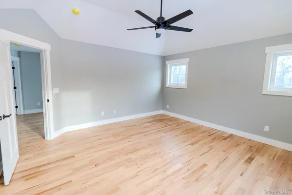 an empty room with windows