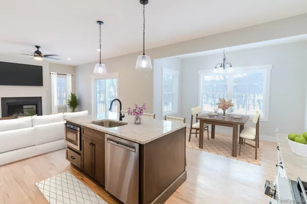 a view of a dining room with furniture and window